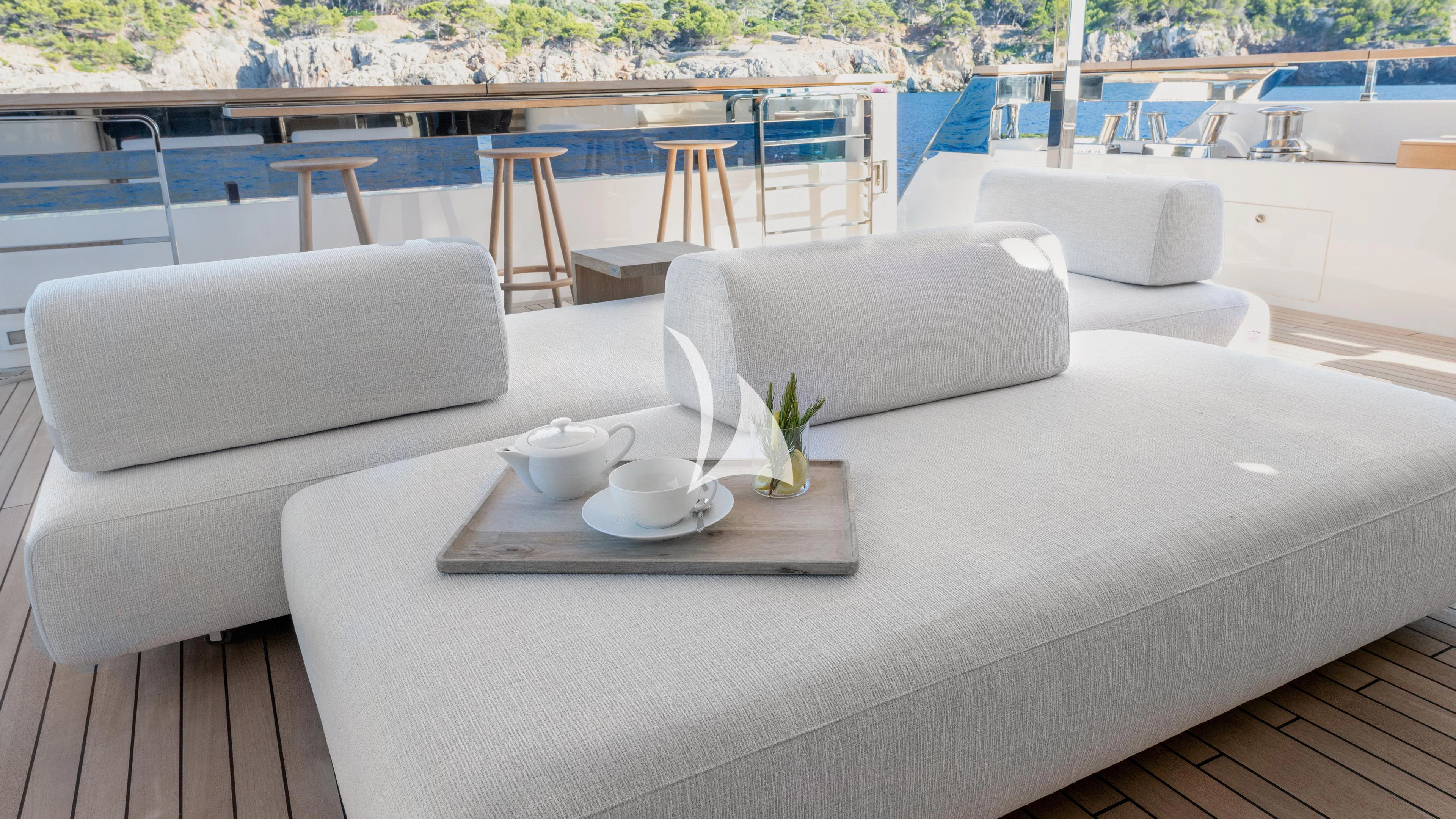 a table with chairs and a couch aboard PALOMA Yacht for Sale