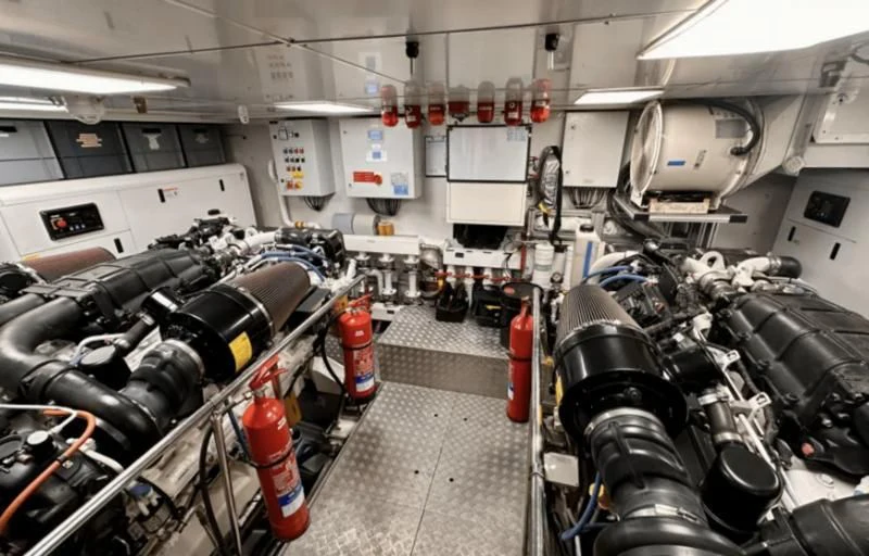 a room full of vehicles aboard PALOMA Yacht for Sale