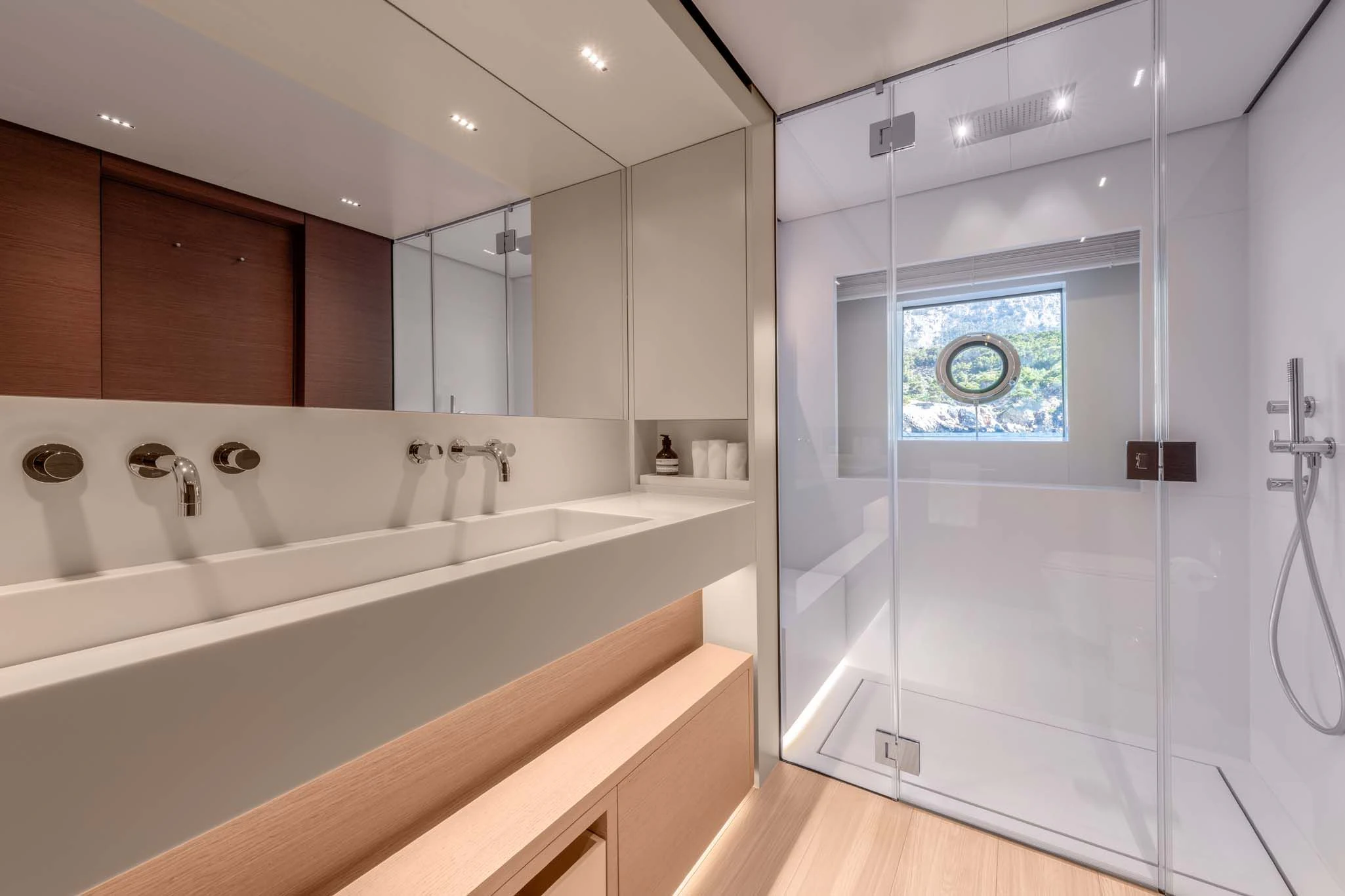 a bathroom with a glass shower aboard PALOMA Yacht for Sale