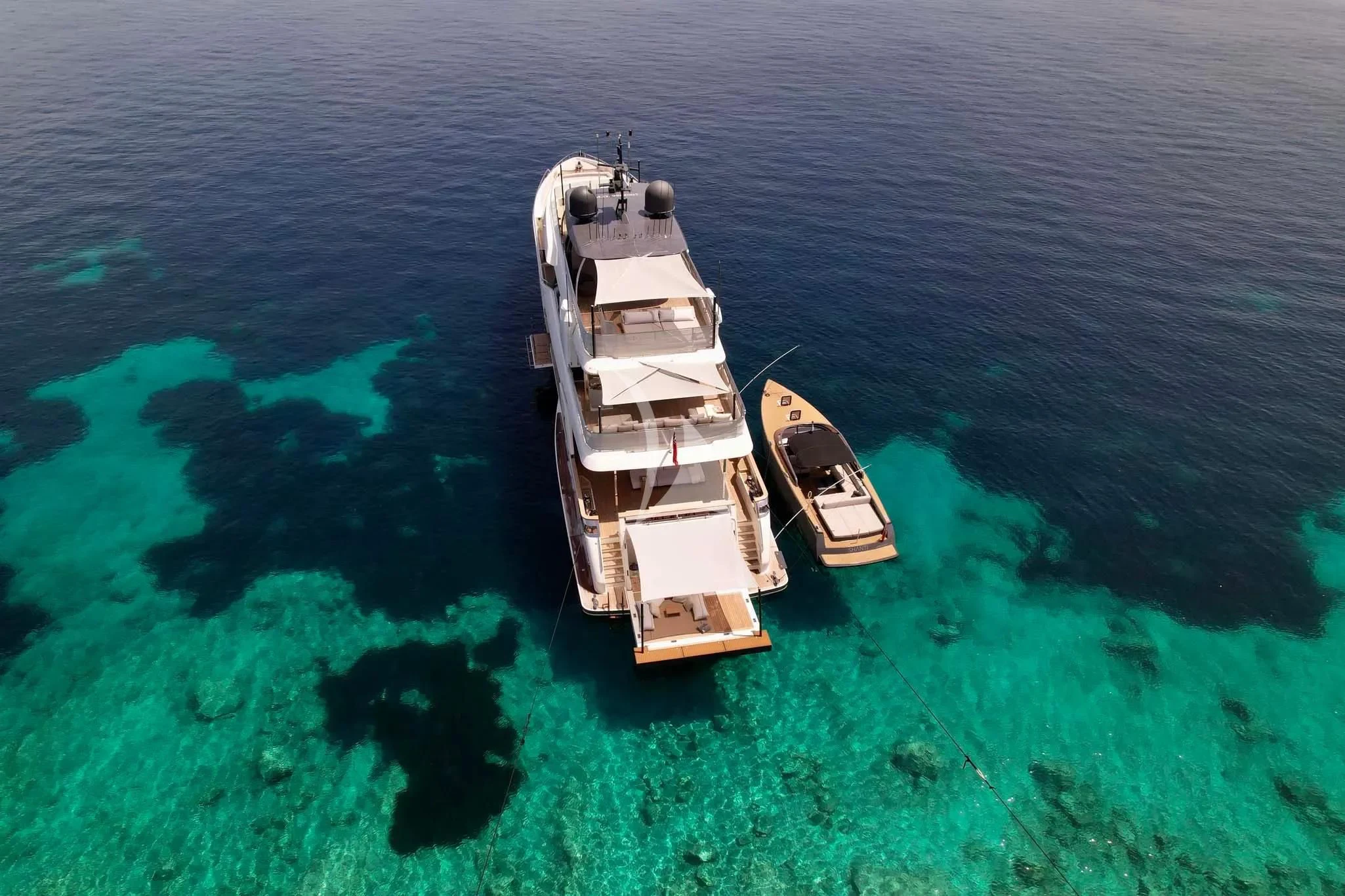 a couple of boats on the water aboard PALOMA Yacht for Sale