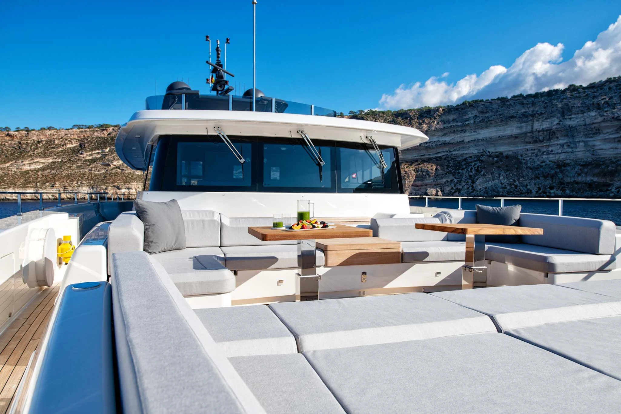 a white building with a white roof aboard PALOMA Yacht for Sale