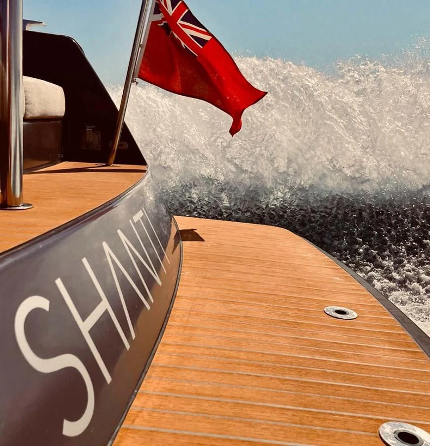 a flag on a table aboard PALOMA Yacht for Sale