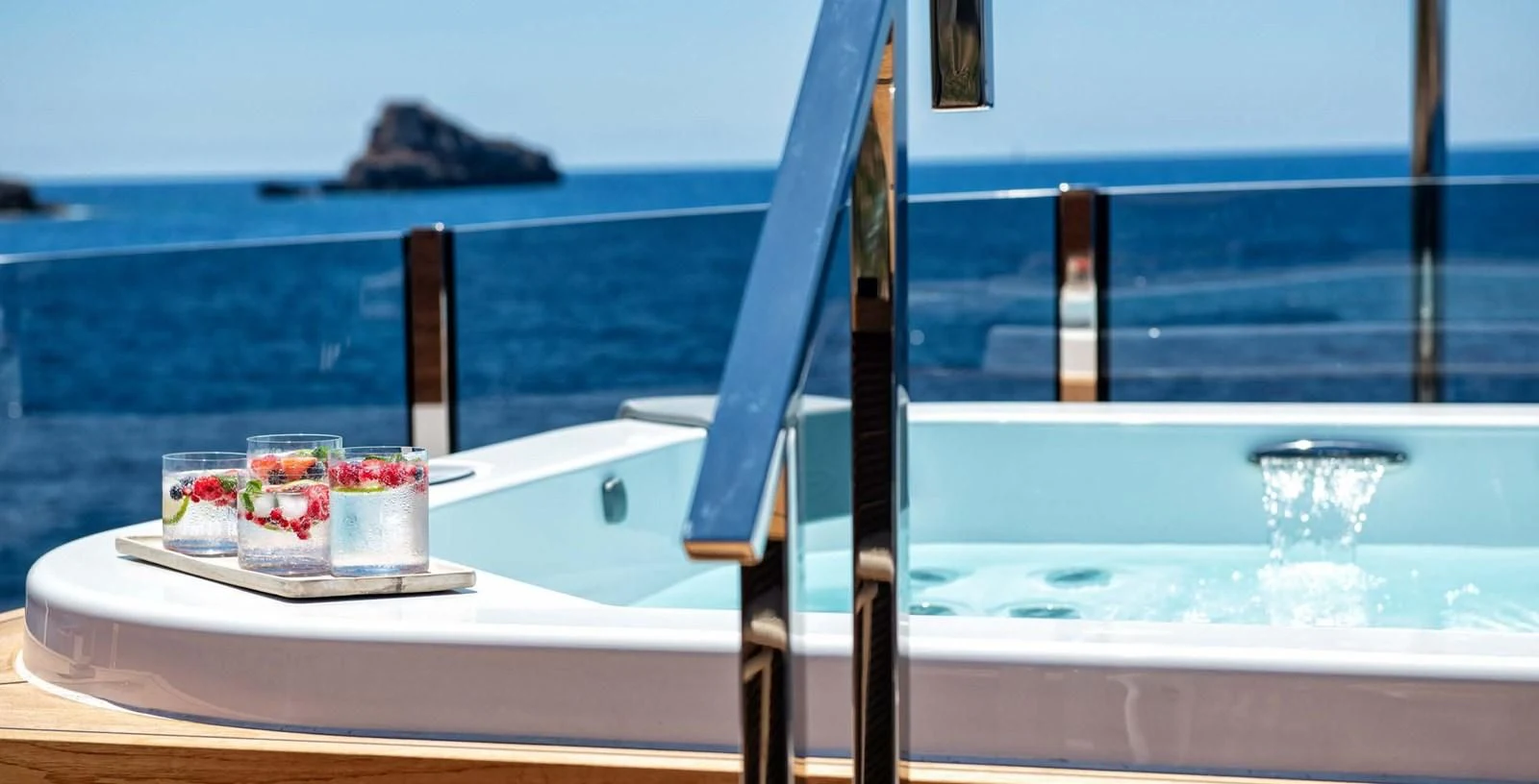 a table with a tray of food and drinks on it aboard PALOMA Yacht for Sale