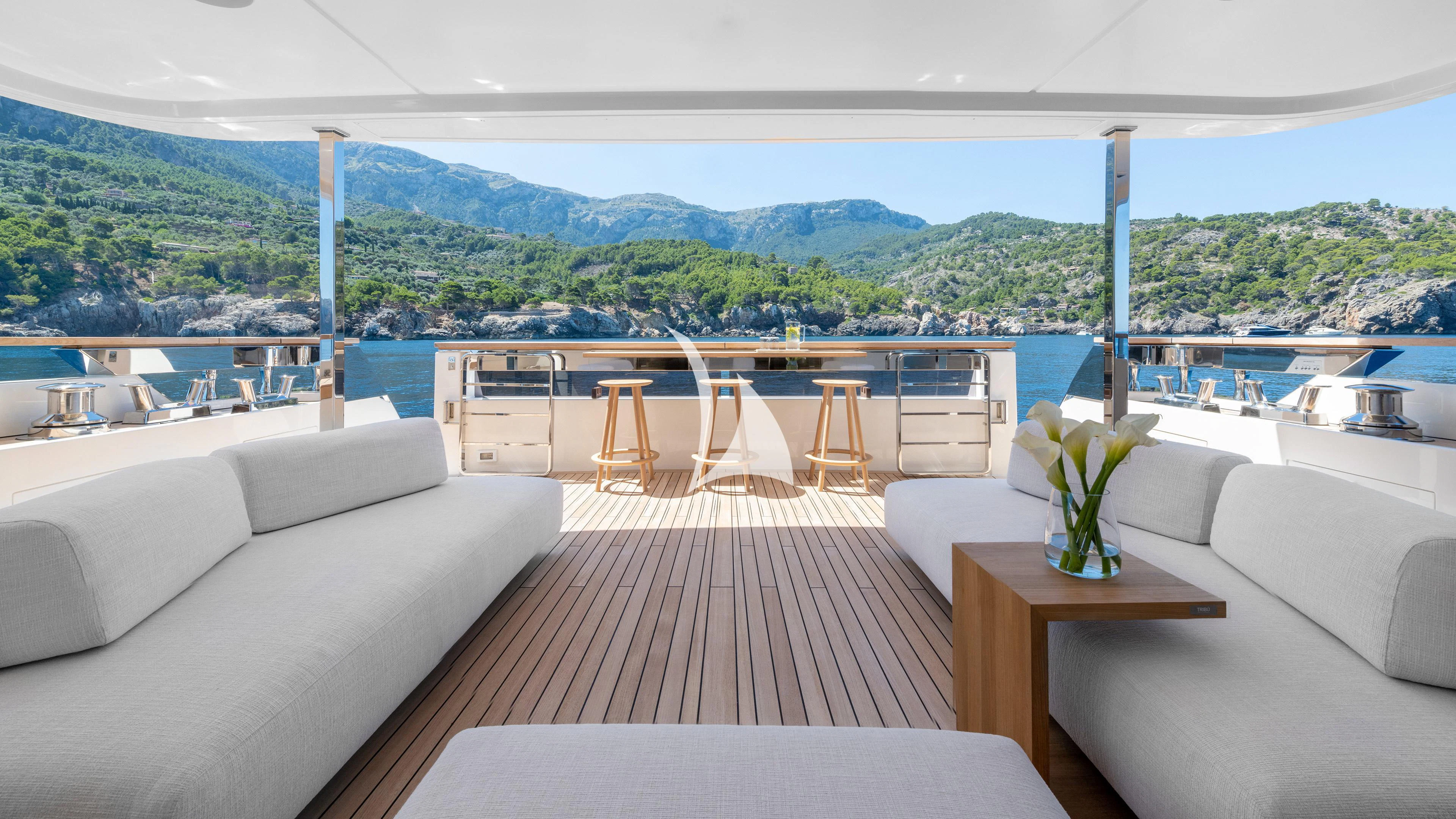 a room with a table and chairs aboard PALOMA Yacht for Sale