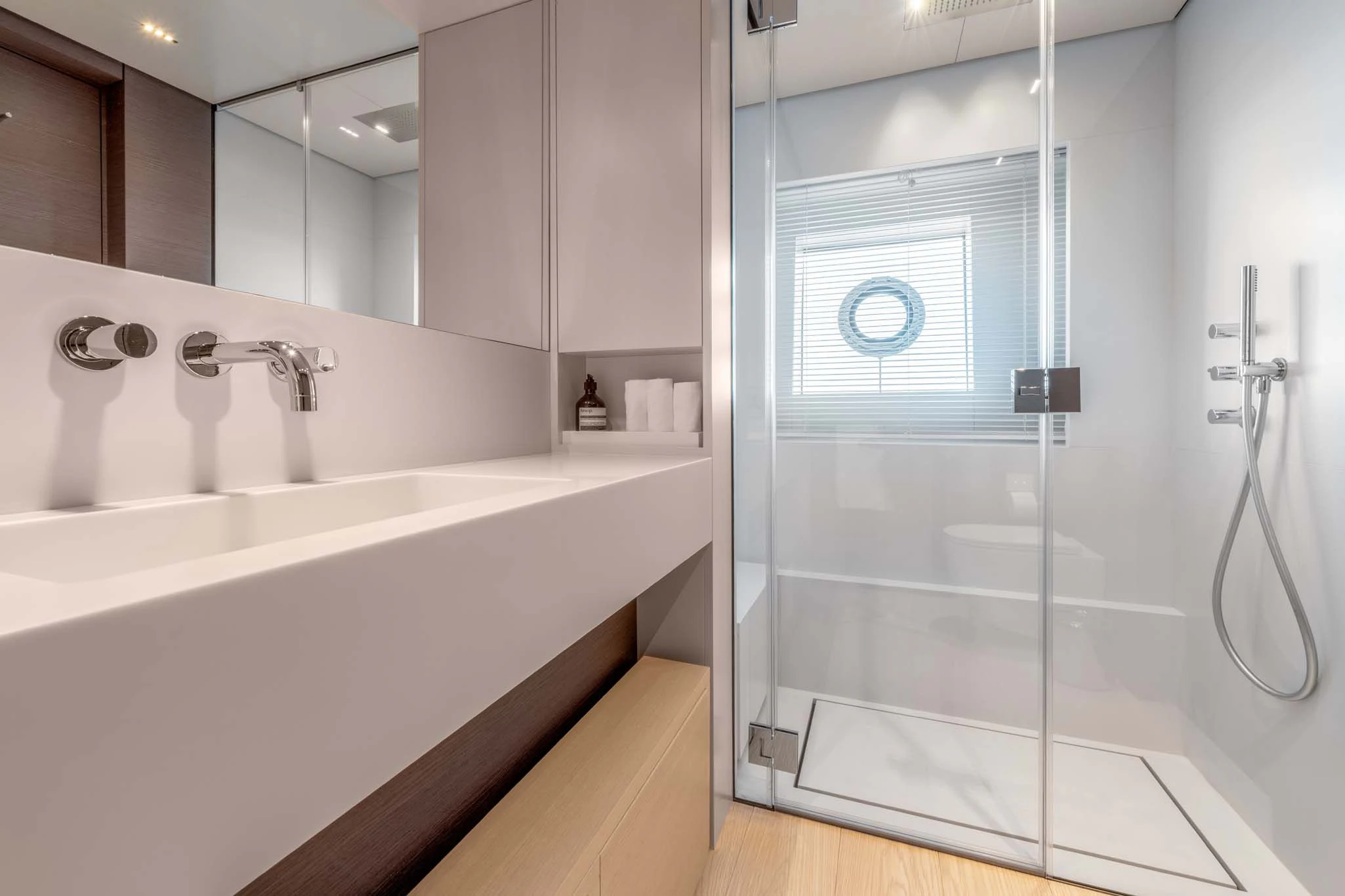 a bathroom with a glass shower aboard PALOMA Yacht for Sale