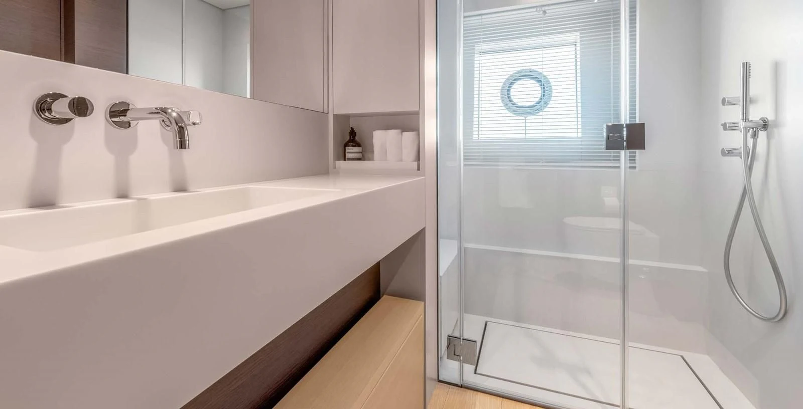 a bathroom with a glass shower aboard PALOMA Yacht for Sale