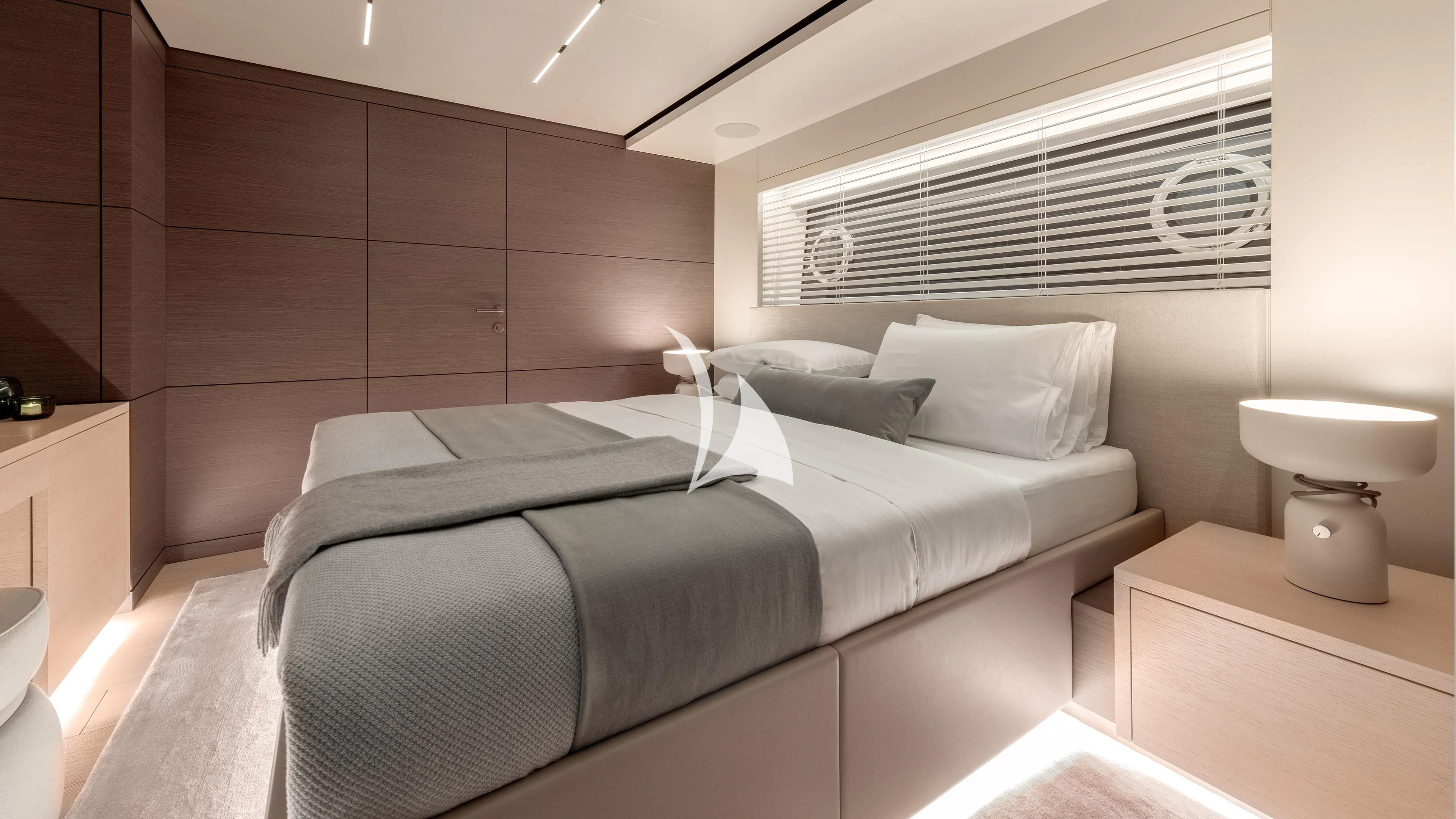 a bed with white pillows aboard PALOMA Yacht for Sale