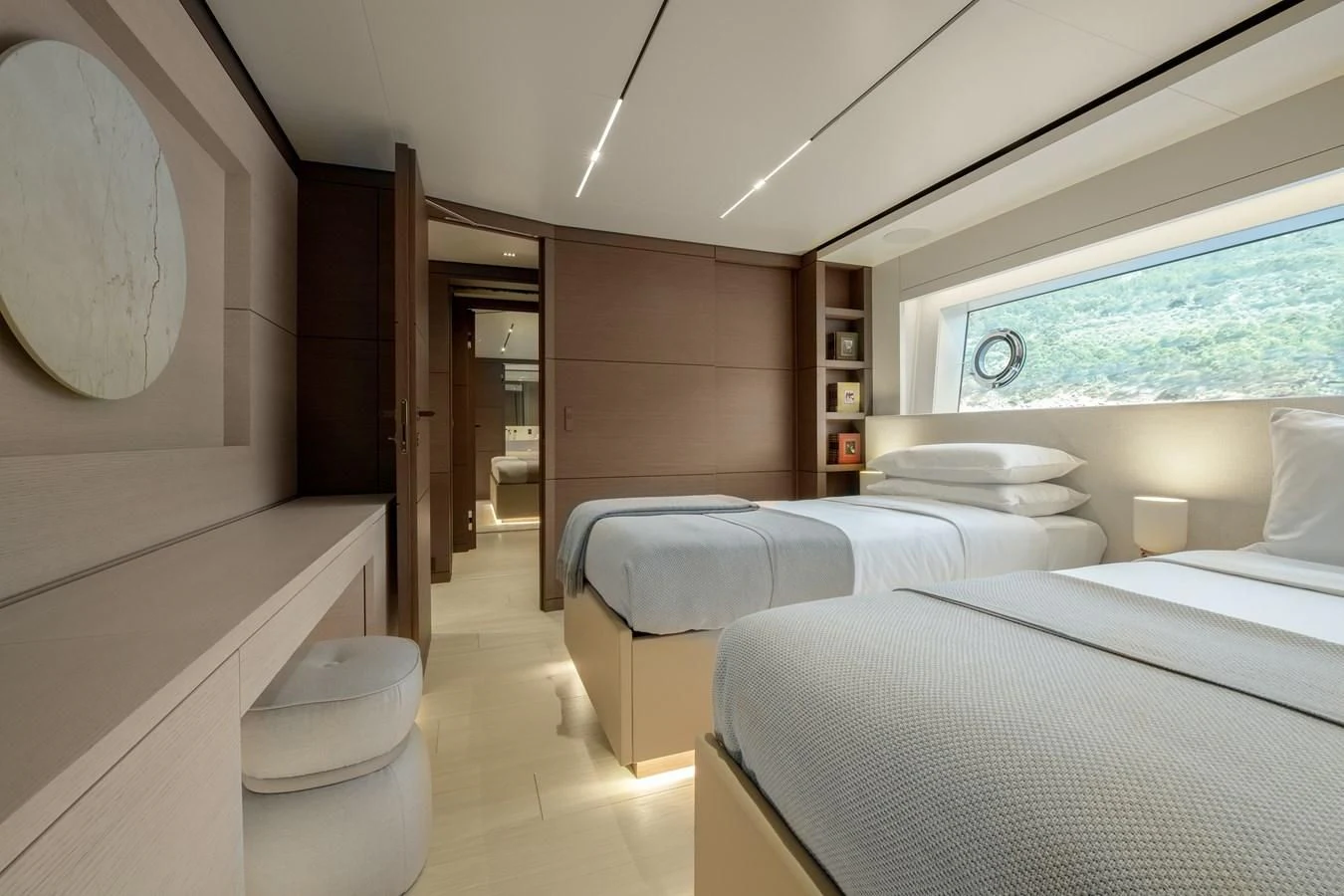 a room with a couple of beds aboard PALOMA Yacht for Sale
