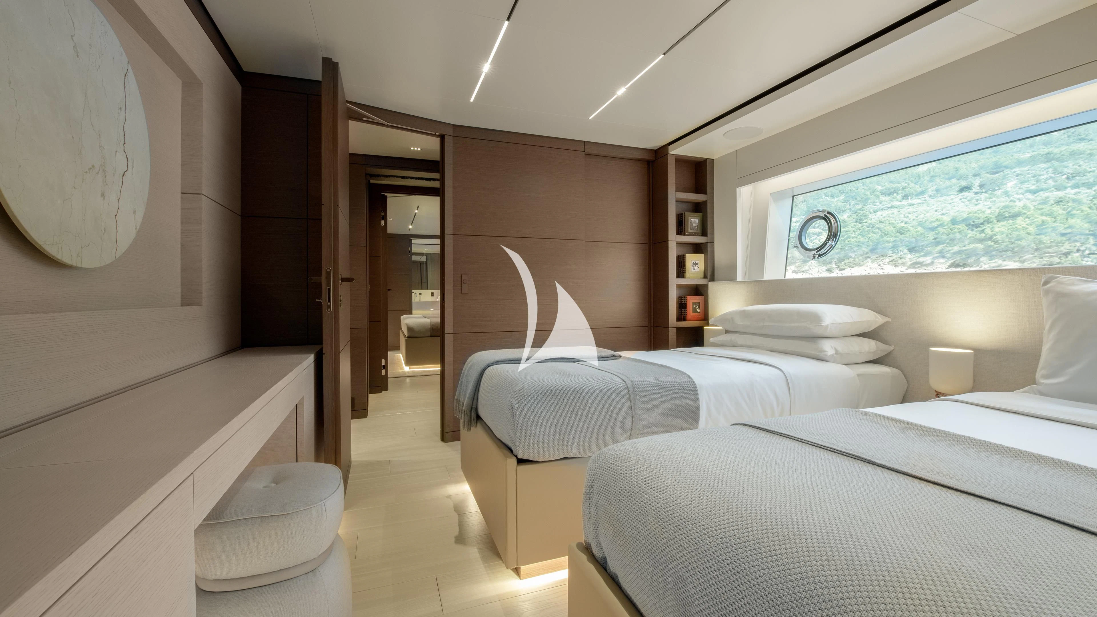 a room with a couple of beds aboard PALOMA Yacht for Sale