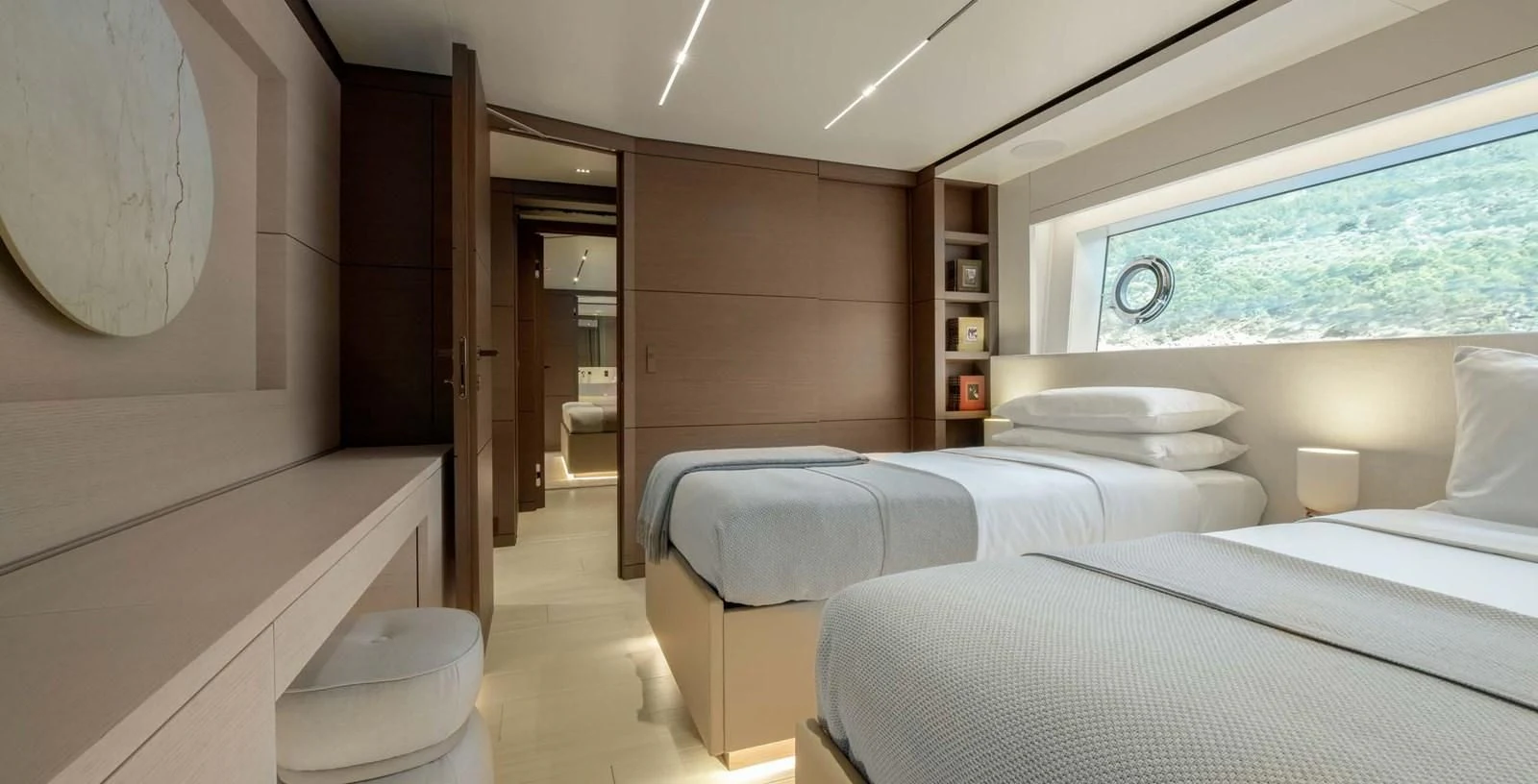 a room with a couple of beds aboard PALOMA Yacht for Sale