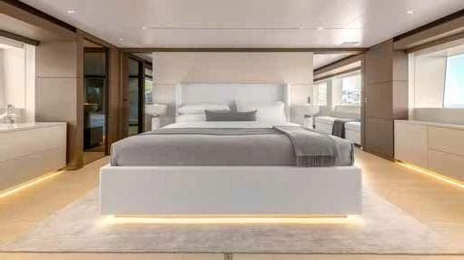 a large bed in a room aboard PALOMA Yacht for Sale