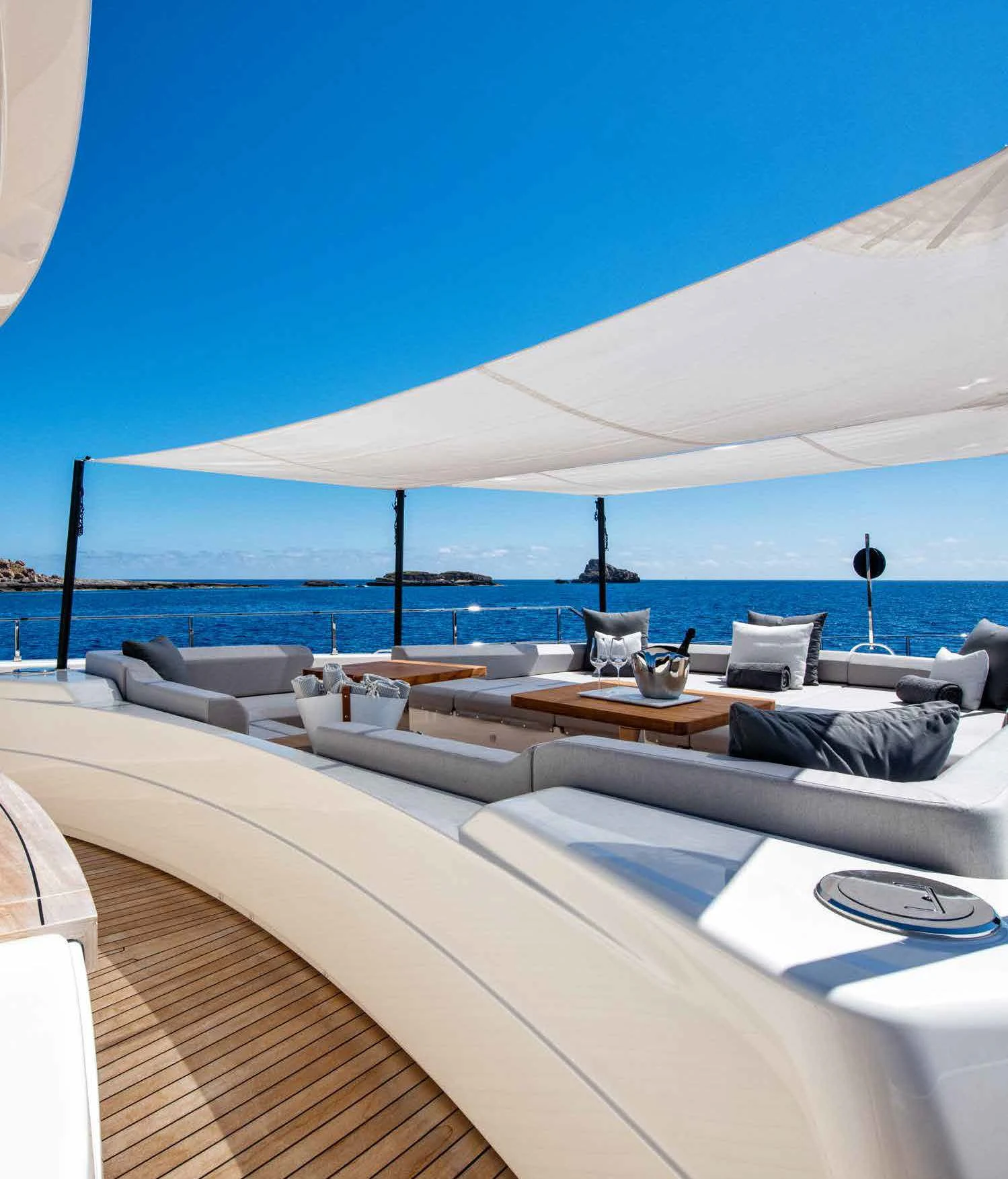 a lounge area with a large umbrella aboard PALOMA Yacht for Sale