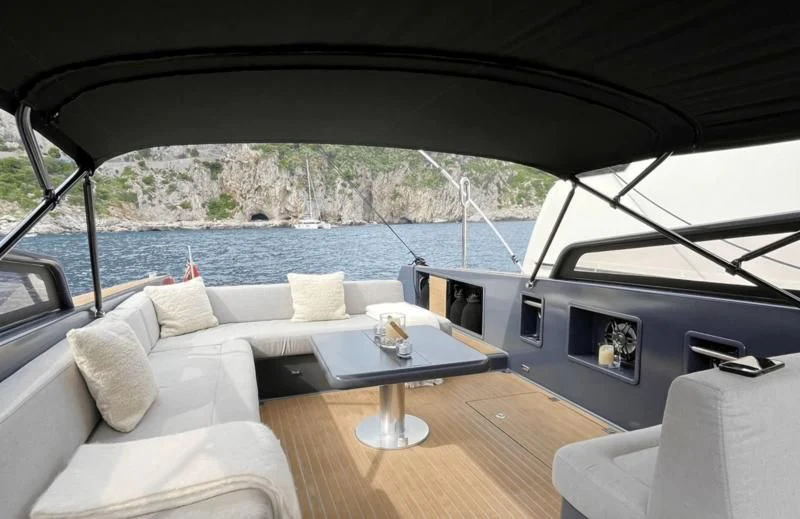 a room with a table and chairs aboard PALOMA Yacht for Sale