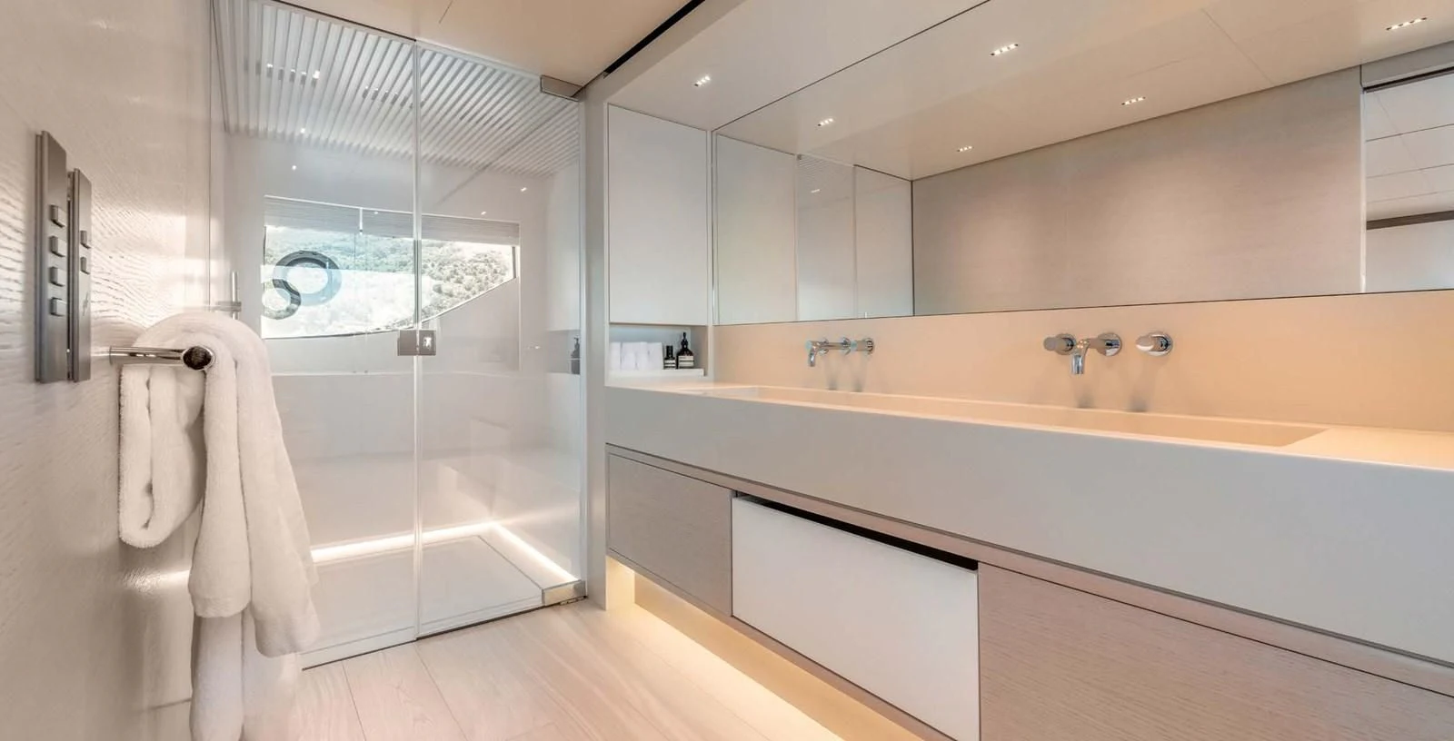 a bathroom with a glass shower aboard PALOMA Yacht for Sale