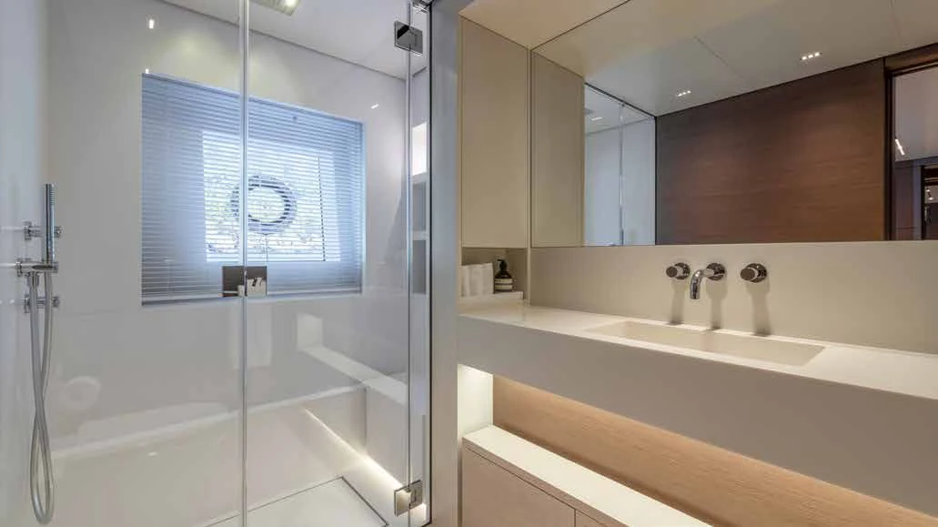 a bathroom with a large mirror aboard PALOMA Yacht for Sale