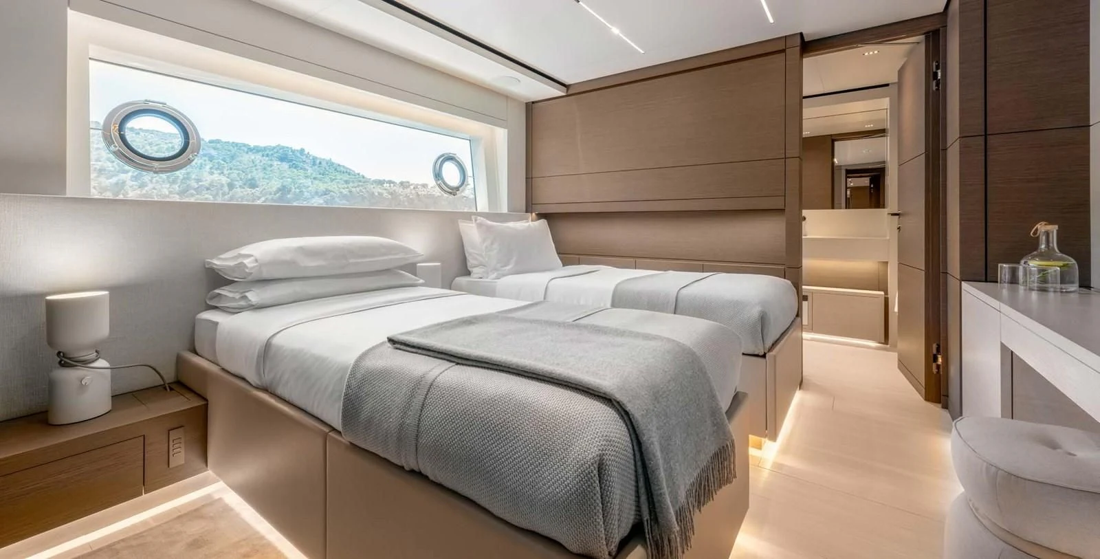 a room with a bed and a window aboard PALOMA Yacht for Sale