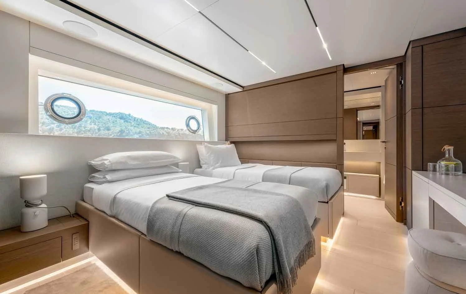 a room with a bed and a window aboard PALOMA Yacht for Sale