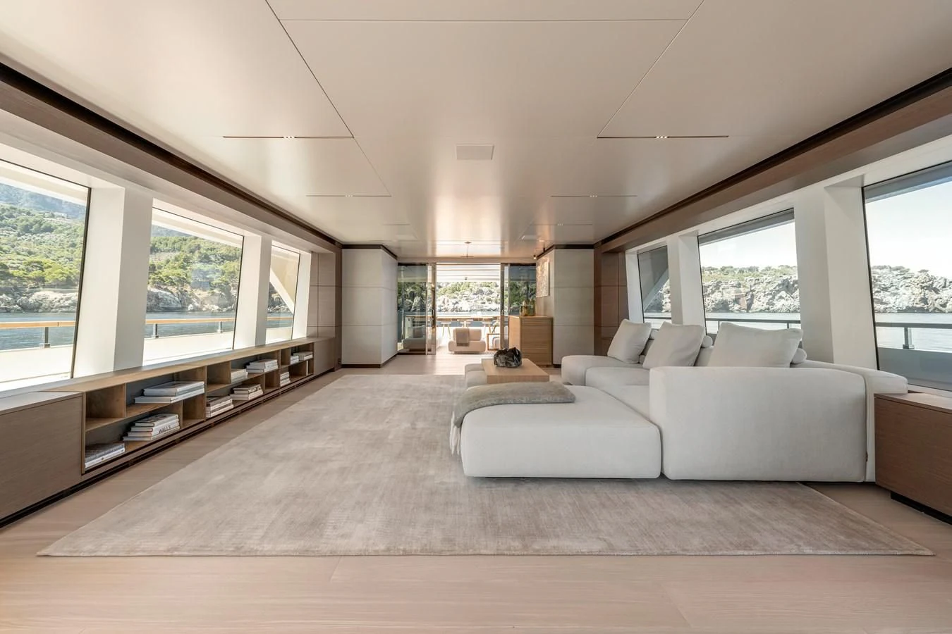 a living room with a large window aboard PALOMA Yacht for Sale