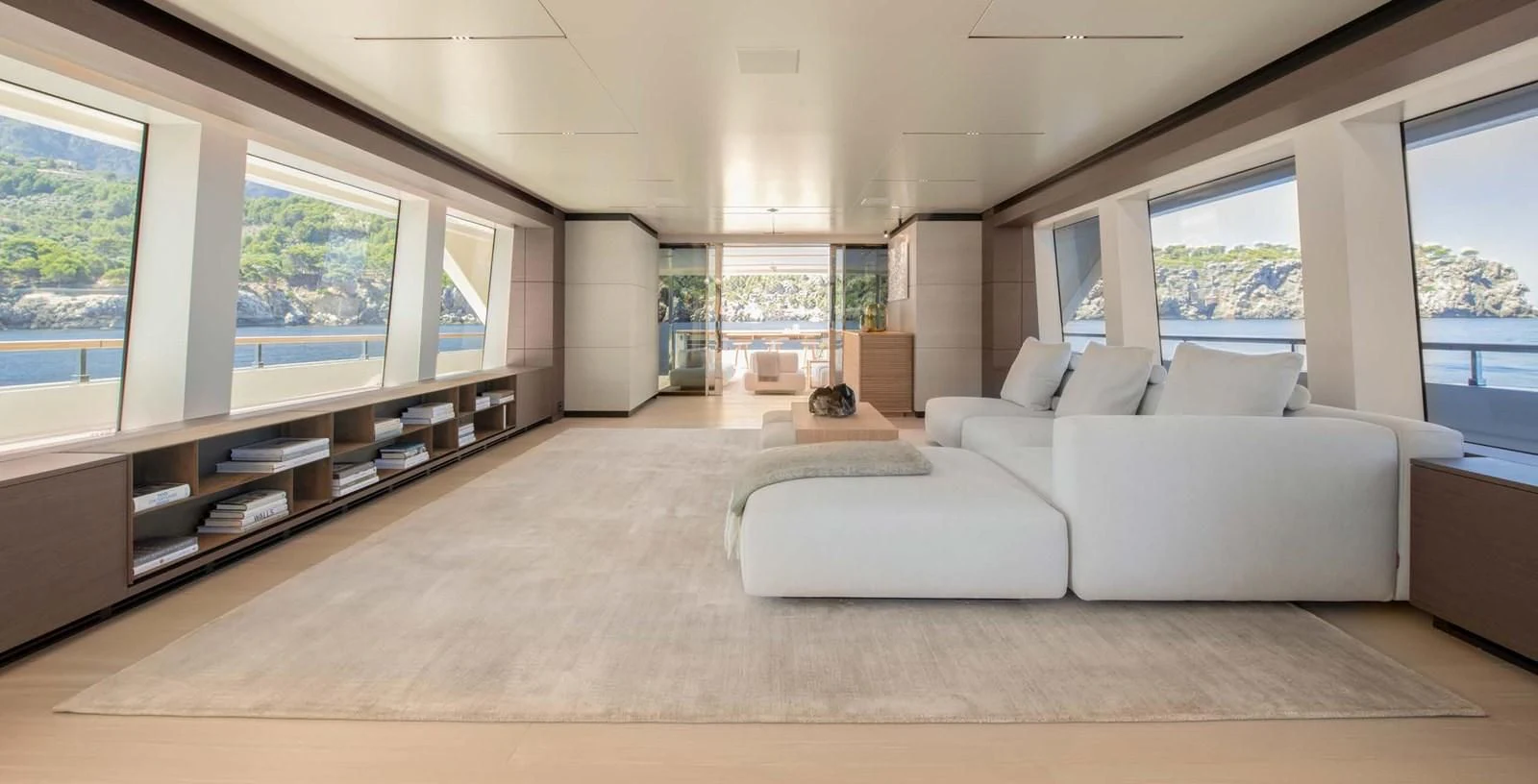 a large living room with a large window aboard PALOMA Yacht for Sale