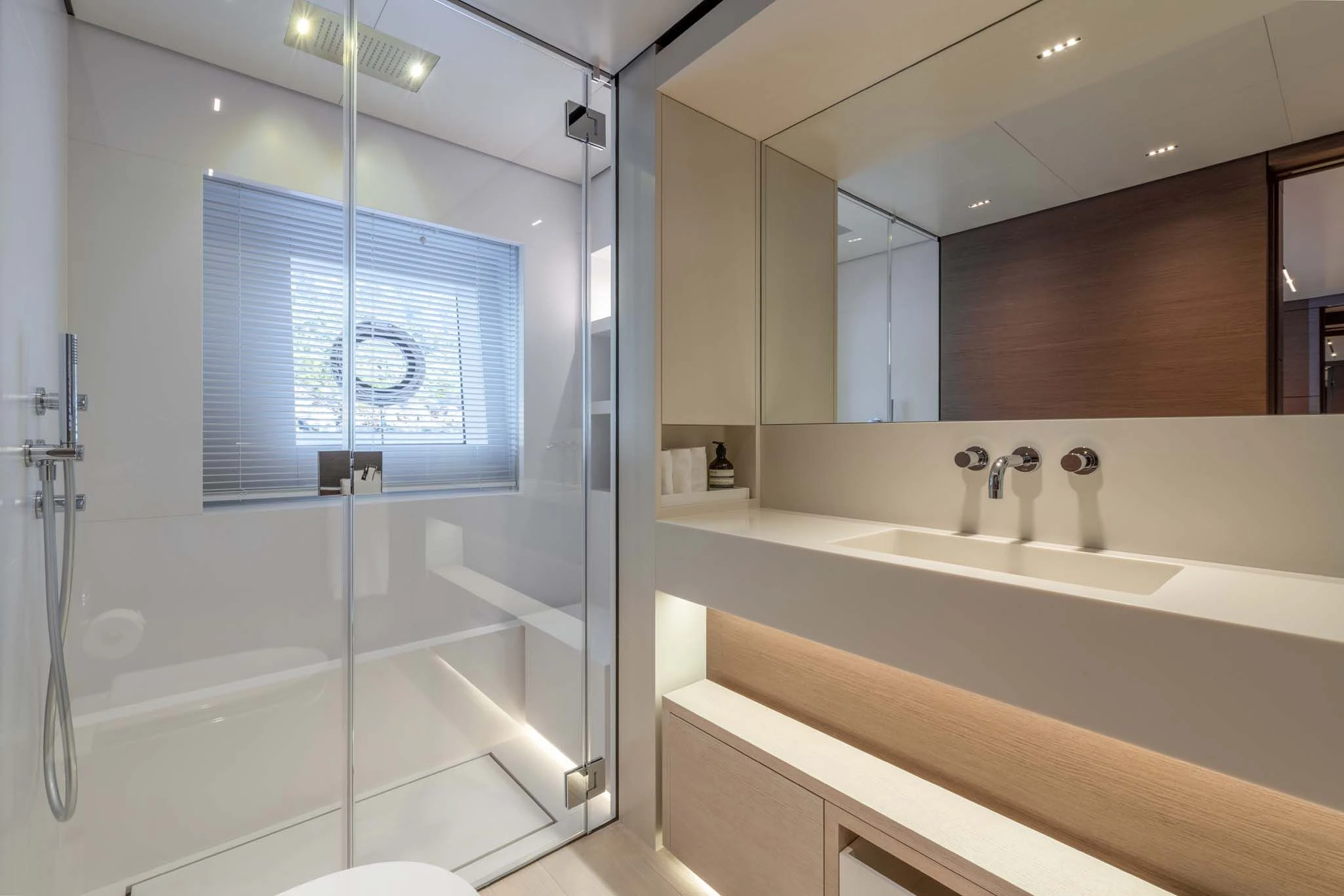 a bathroom with a glass shower aboard PALOMA Yacht for Sale