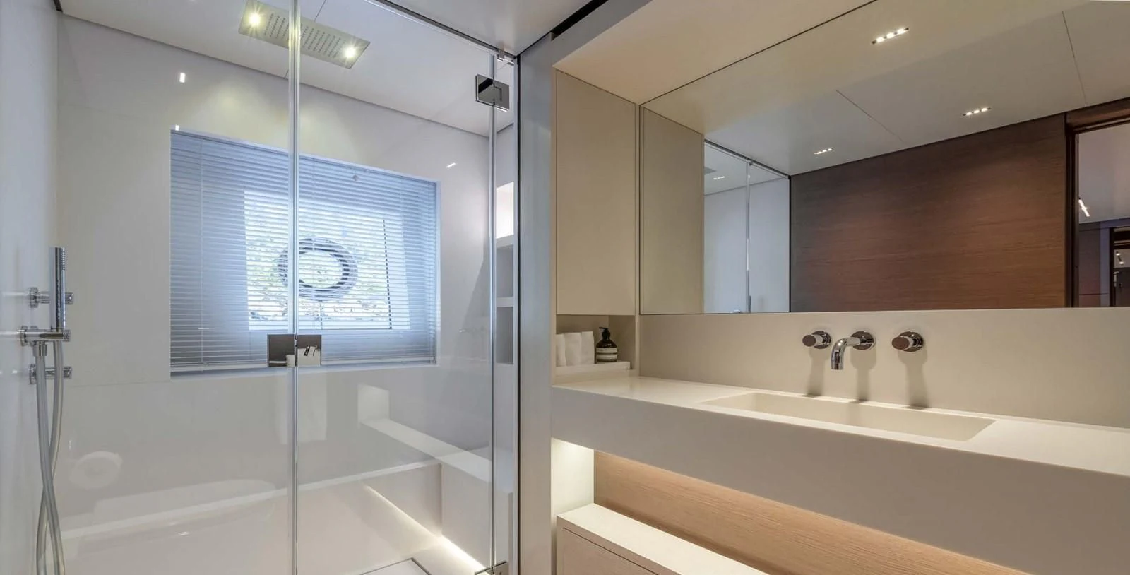 a bathroom with a large mirror aboard PALOMA Yacht for Sale