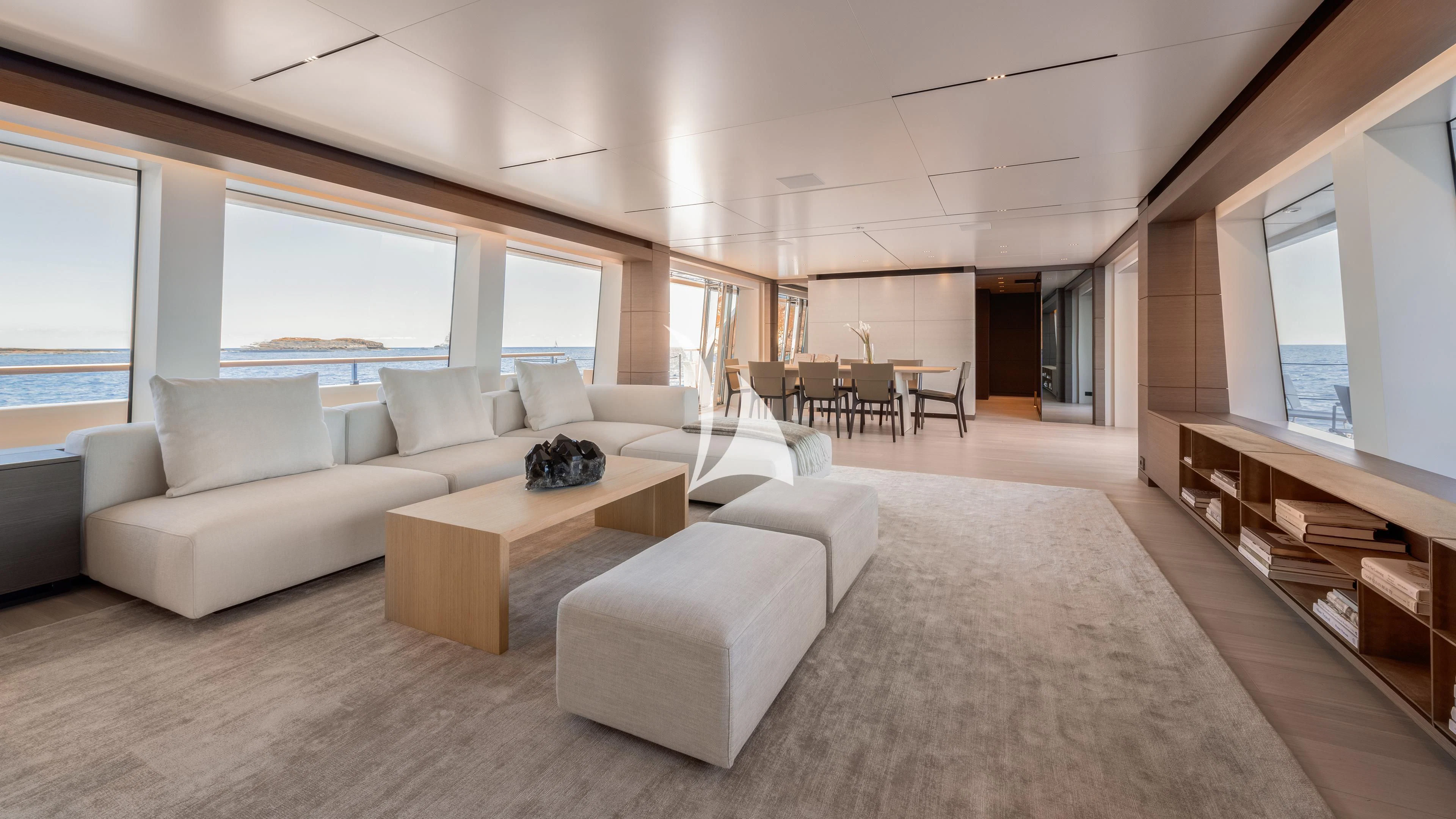 a living room with a large window aboard PALOMA Yacht for Sale