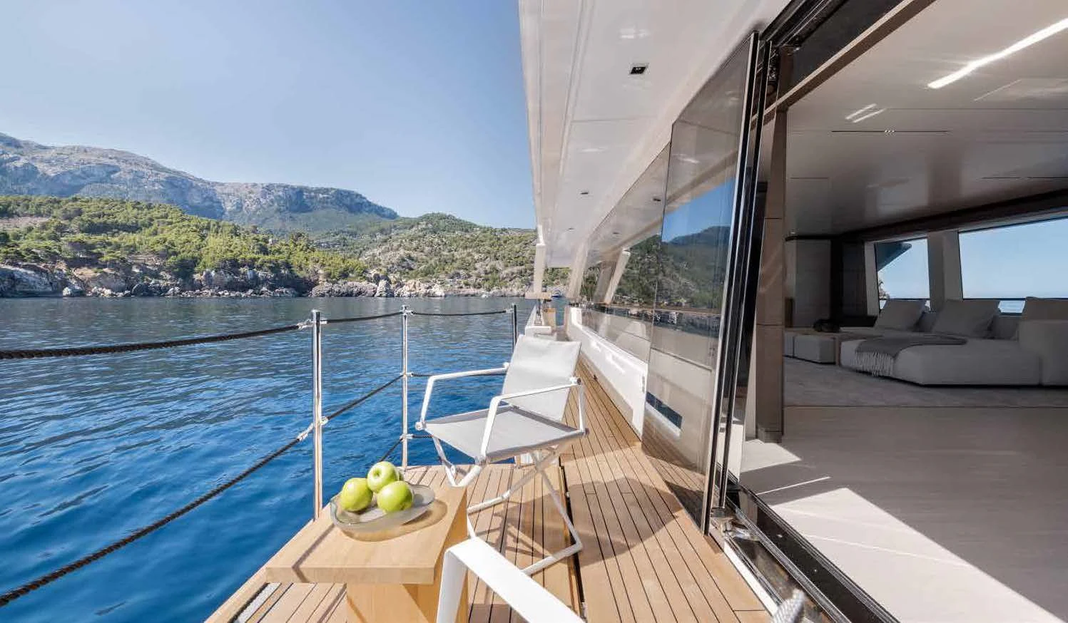 a balcony overlooking a body of water aboard PALOMA Yacht for Sale