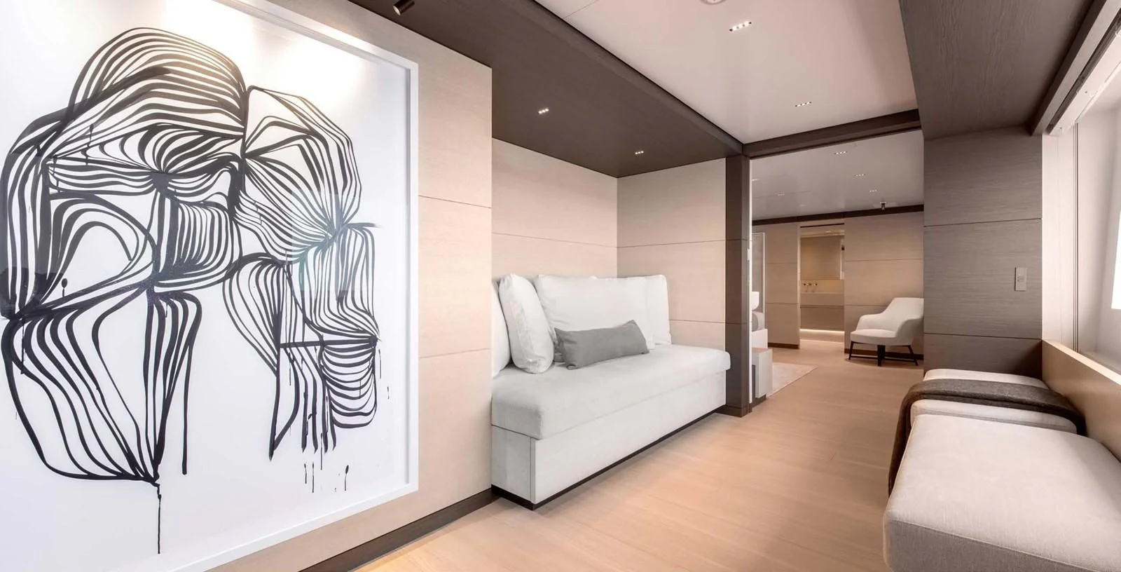 a room with a couch and a bed aboard PALOMA Yacht for Sale