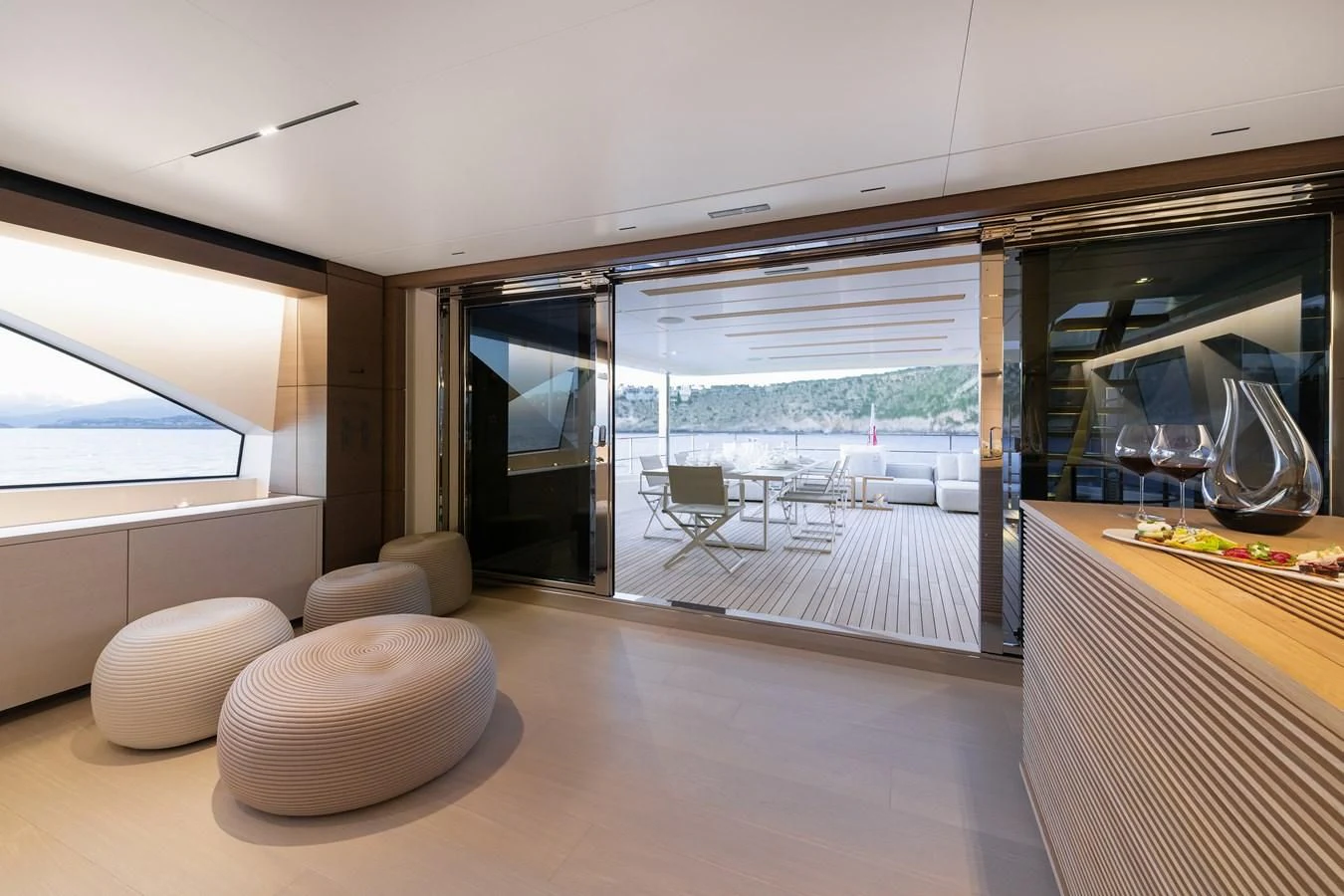 a room with a view of the ocean and the patio aboard PALOMA Yacht for Sale