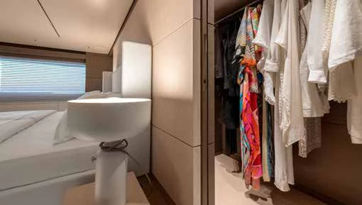 a bathroom with a sink and bathtub aboard PALOMA Yacht for Sale