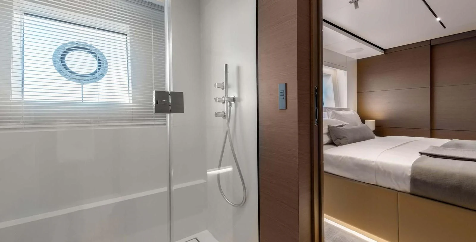 a room with a bed and a window aboard PALOMA Yacht for Sale