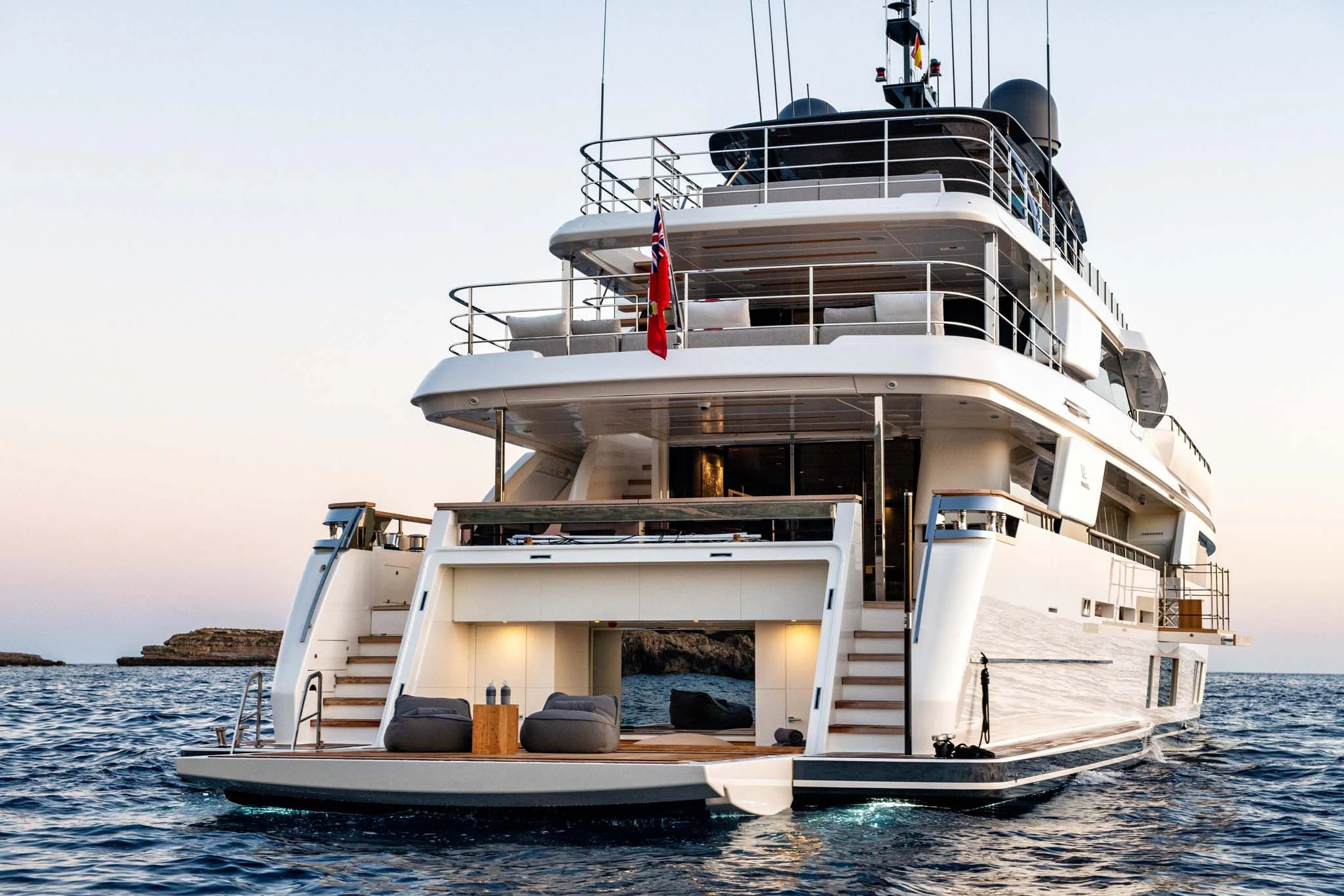 a large white boat in the water aboard PALOMA Yacht for Sale
