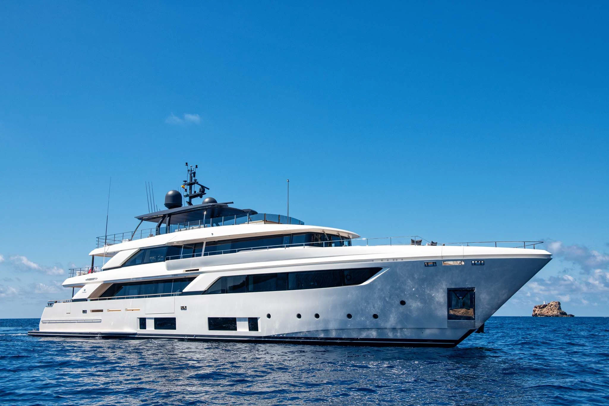 a white yacht in the water aboard PALOMA Yacht for Sale