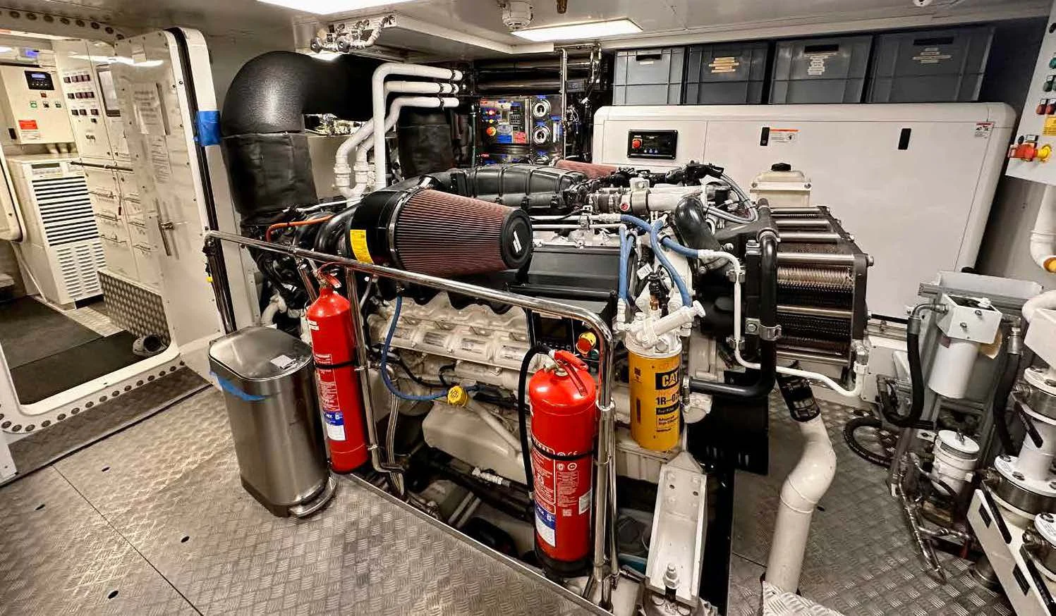 a room with machinery and pipes aboard PALOMA Yacht for Sale