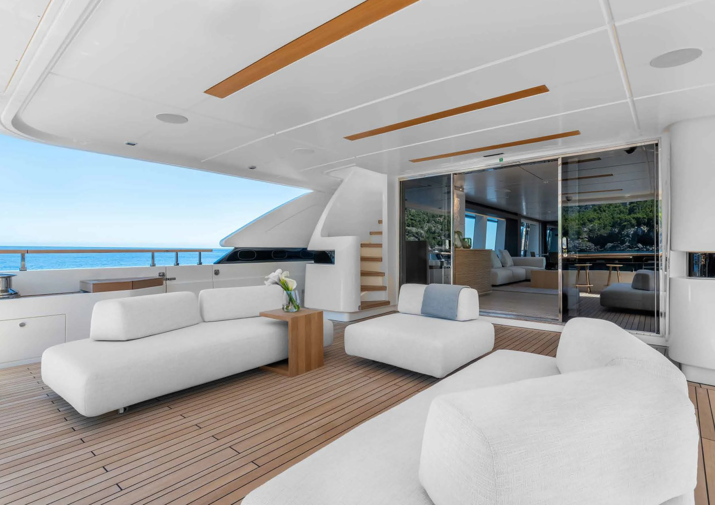 a living room with a large swimming pool aboard PALOMA Yacht for Sale