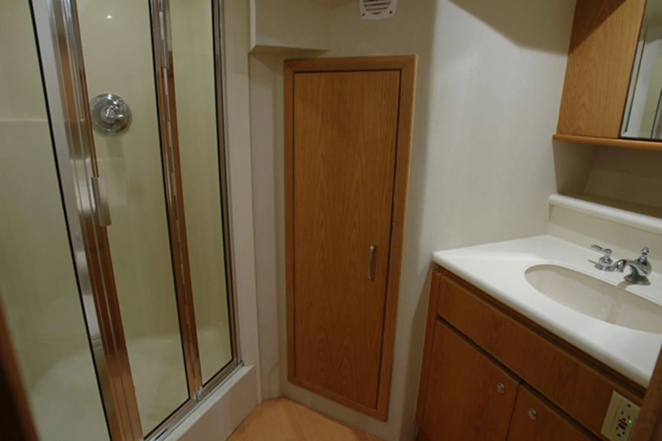 a bathroom with a sink and a shower aboard SANTO ANTONIO Yacht for Sale