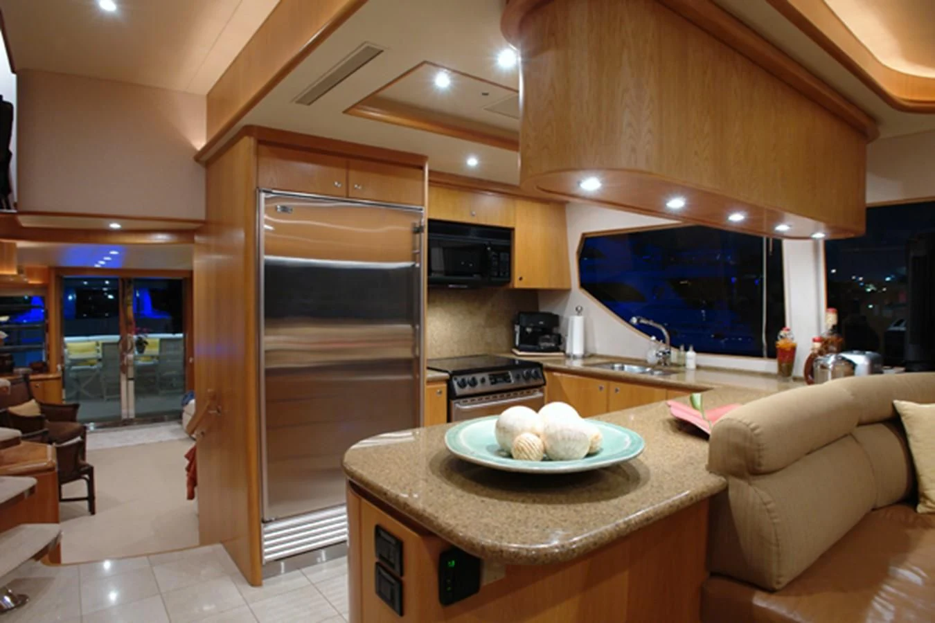 a kitchen with a large island aboard SANTO ANTONIO Yacht for Sale
