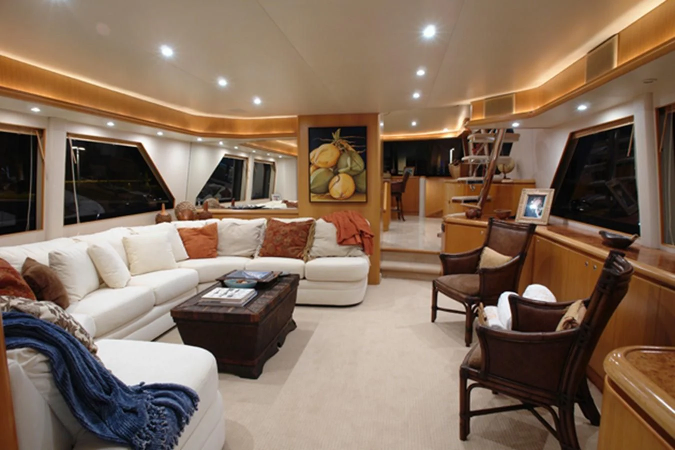 a living room with a couch and a television aboard SANTO ANTONIO Yacht for Sale