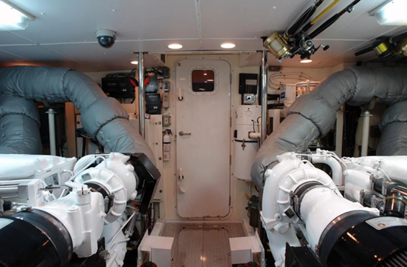 a person's hand holding a machine aboard SANTO ANTONIO Yacht for Sale