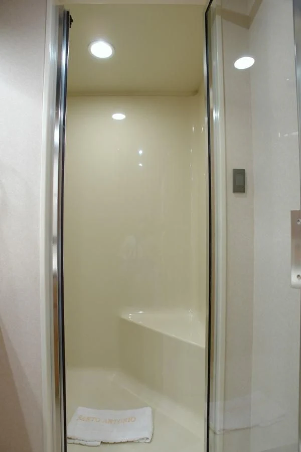 a shower with a glass door aboard SANTO ANTONIO Yacht for Sale