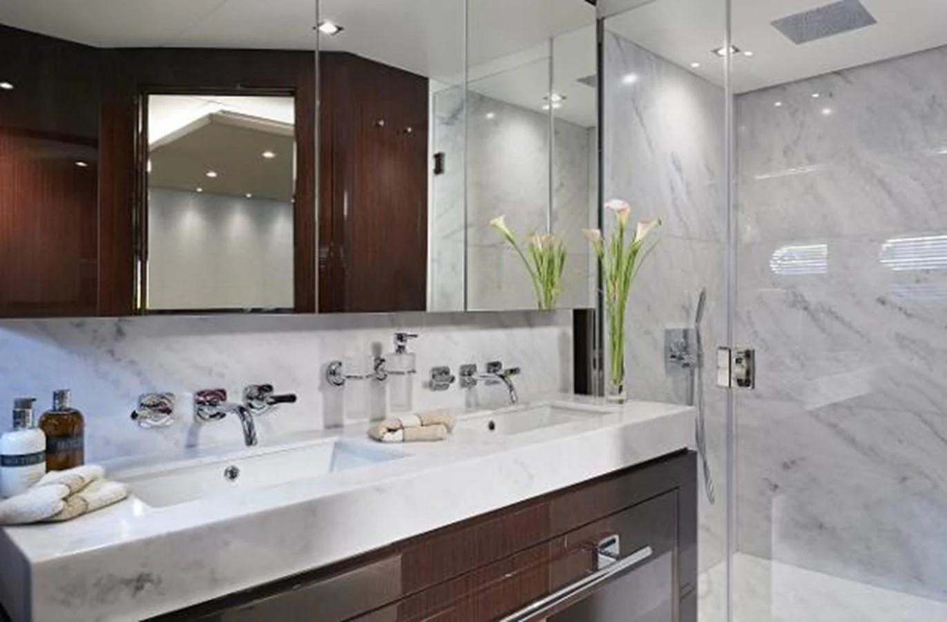a bathroom with a large mirror aboard 95 YACHT Yacht for Sale