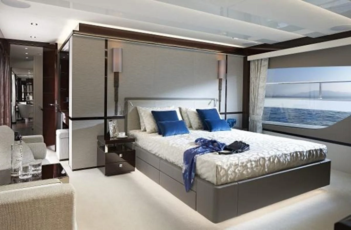 a bed with a white sheet and pillows on it aboard 95 YACHT Yacht for Sale
