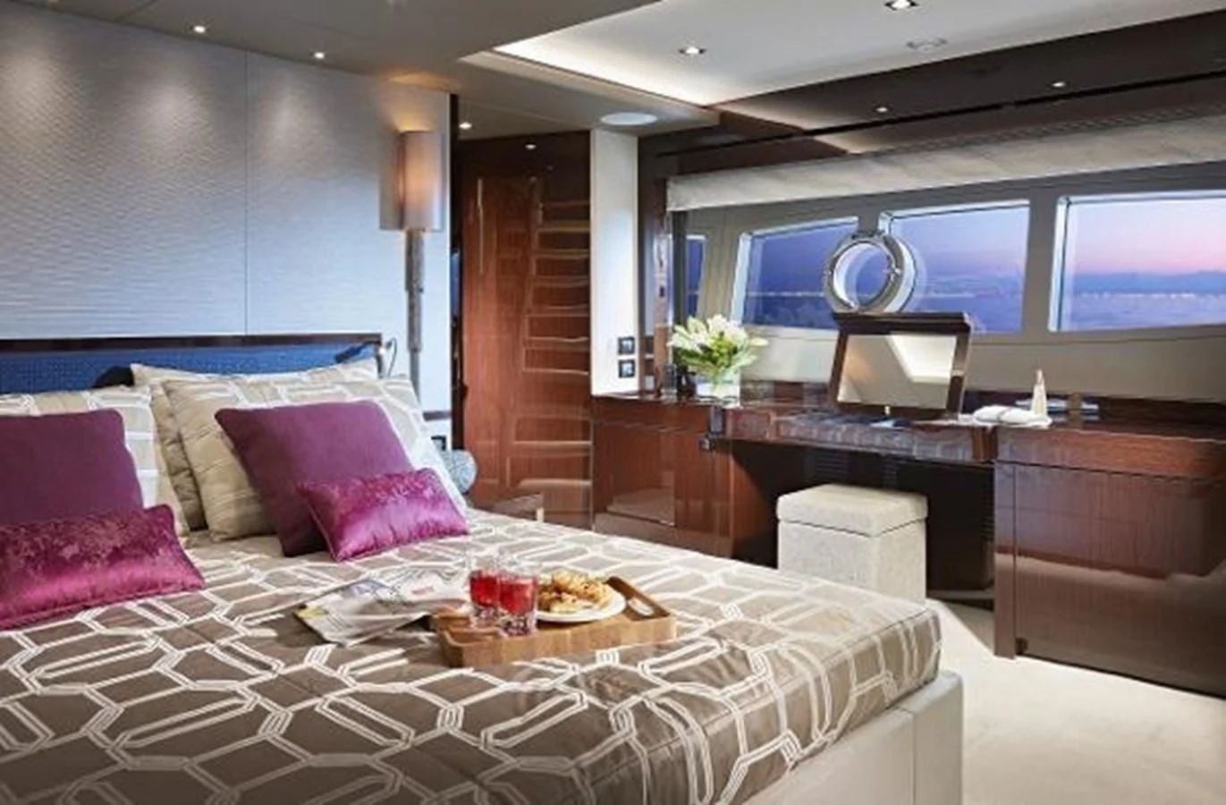 a bed with a tray of food aboard 95 YACHT Yacht for Sale