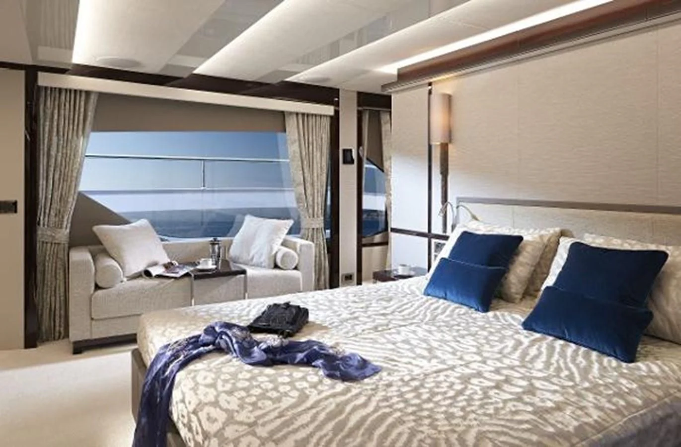 a hotel room with a bed and a large window aboard 95 YACHT Yacht for Sale