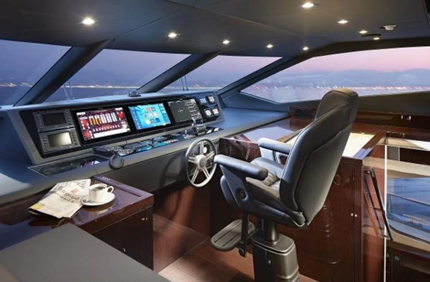 a car with a screen and a desk with a computer on it aboard 95 YACHT Yacht for Sale