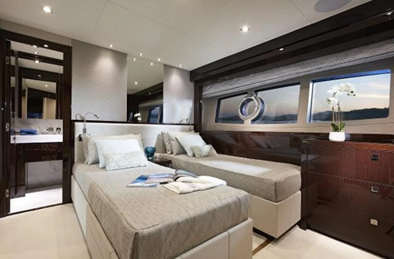 a room with a bed and a television aboard 95 YACHT Yacht for Sale