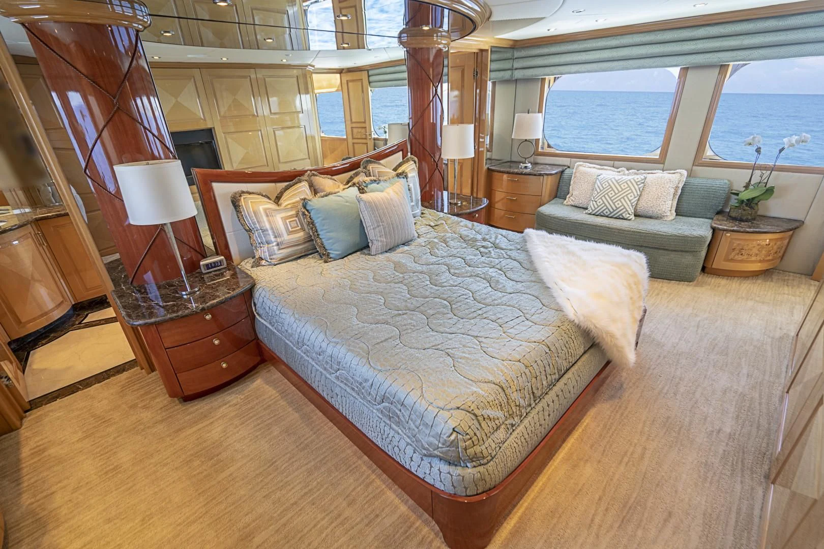 a large bed in a room aboard SEAQUEST Yacht for Sale