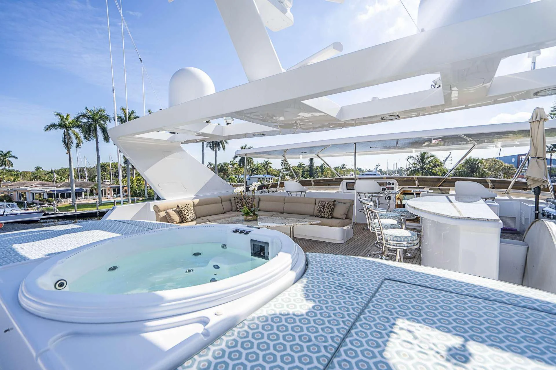 a large white building with a swimming pool aboard SEAQUEST Yacht for Sale