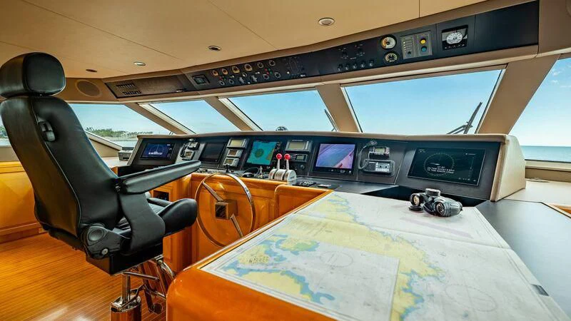 a room with a desk and computer aboard SEAQUEST Yacht for Sale