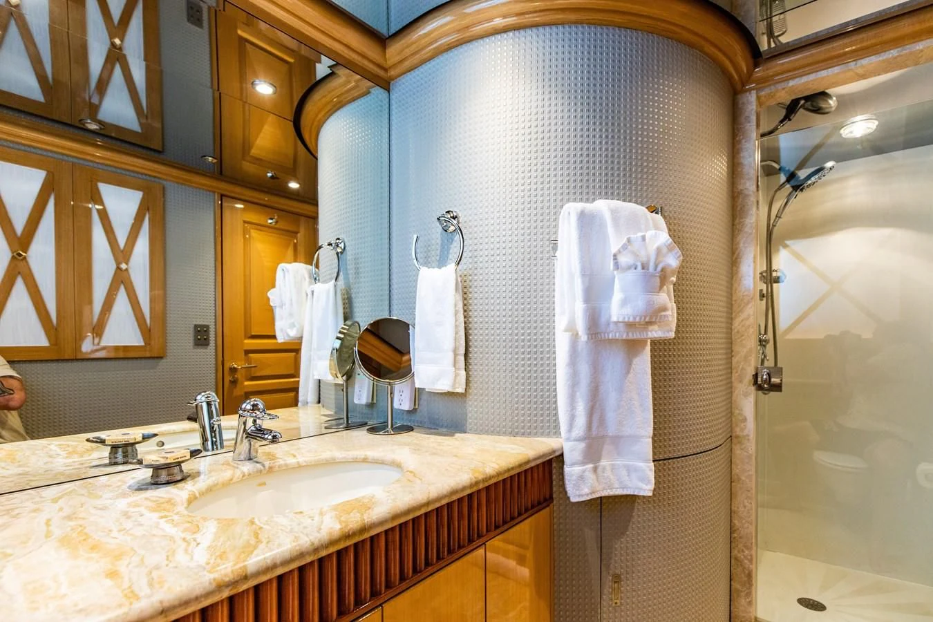 a bathroom with a sink and a mirror aboard SEAQUEST Yacht for Sale